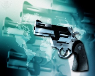 Conceptual computer artwork of guns against a background of an Earth map